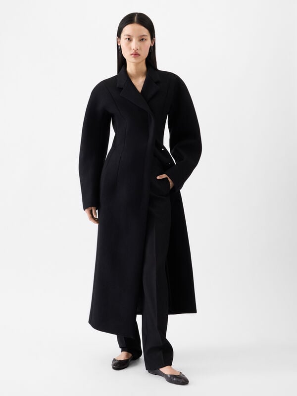 The Curvo coat jacquemus the curvo معطف