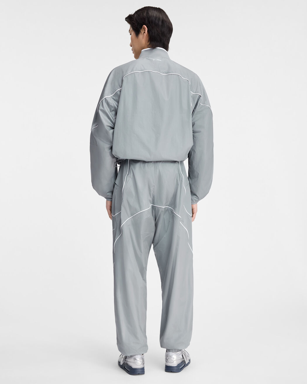 The JACQUEMUS+NIKE track jacket the jacquemus nike track jacket