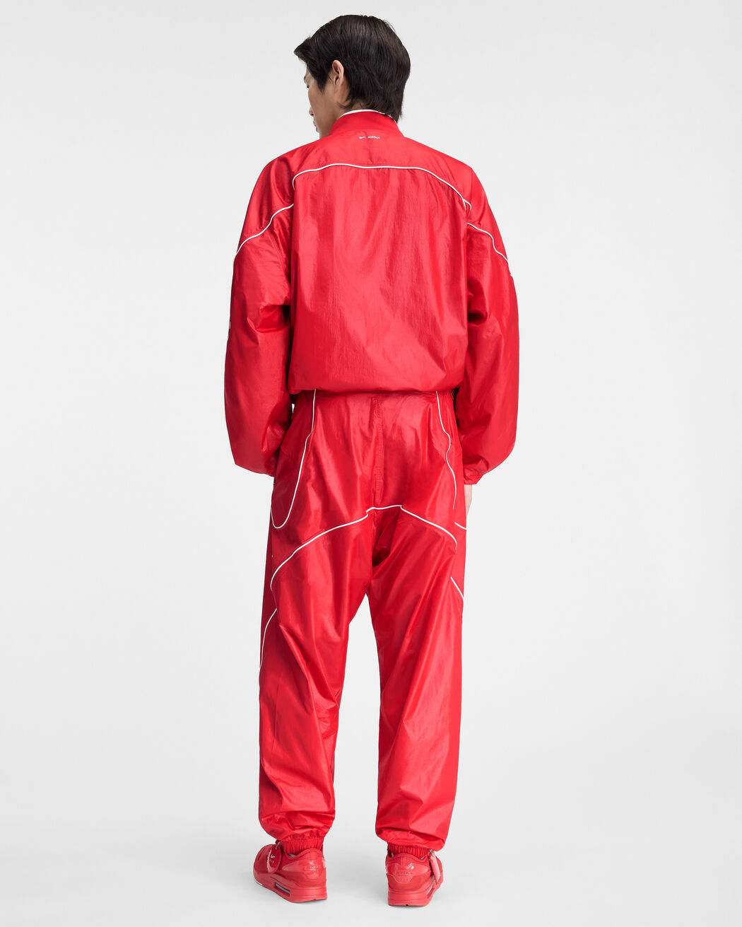 The JACQUEMUS+NIKE track jacket the jacquemus nike track jacket