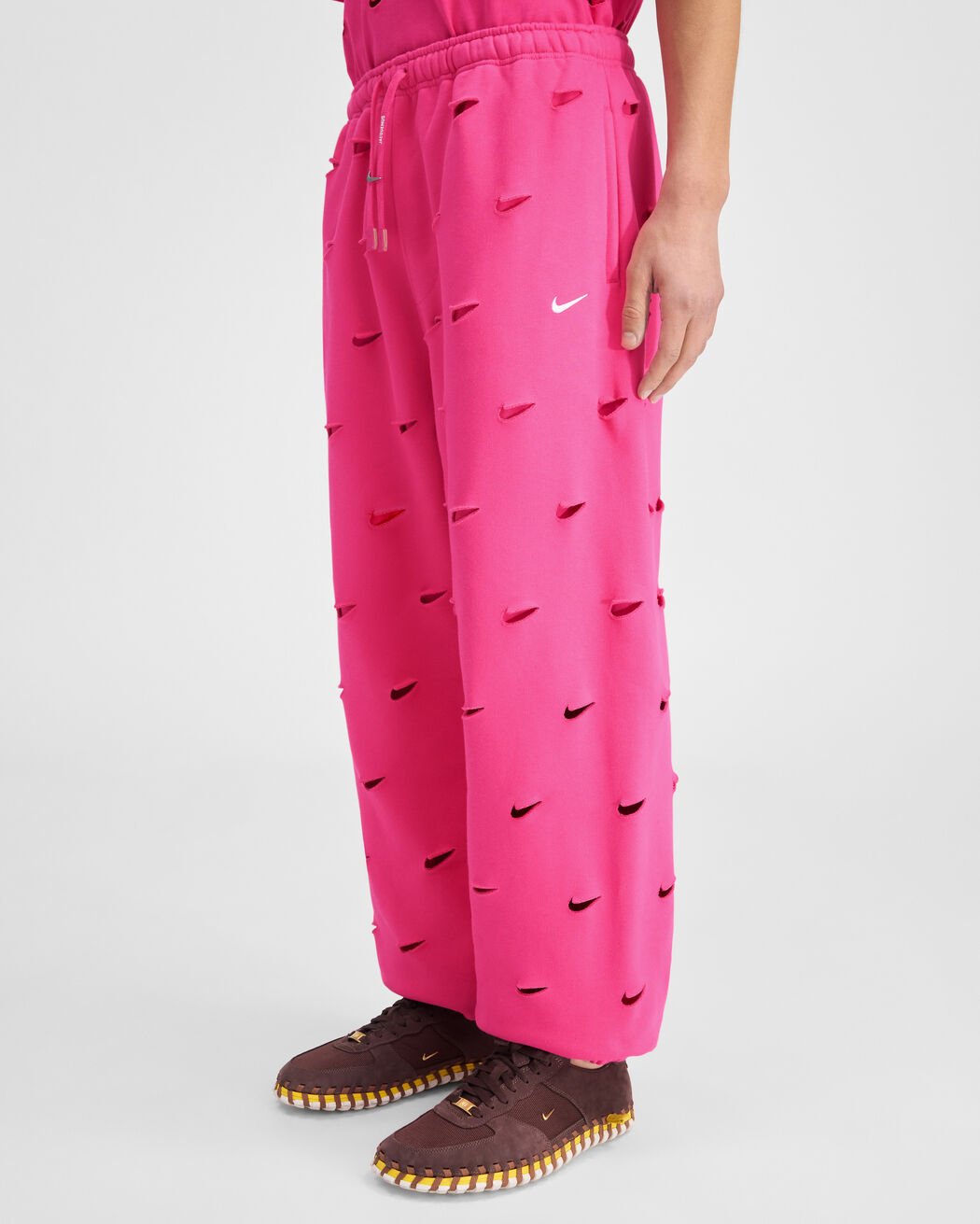 The Swoosh JACQUEMUS+NIKE track pants the swoosh jacquemus nike track pants