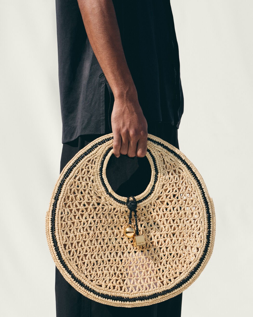 The Spiaggia small round bag jacquemus the spiaggia small round bag