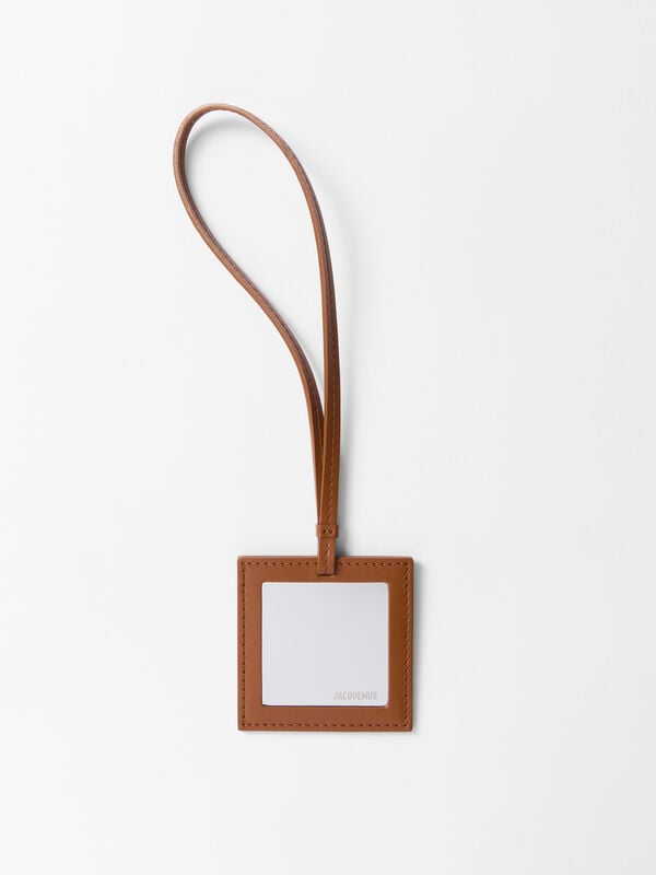 The mirror charm jacquemus the mirror charm