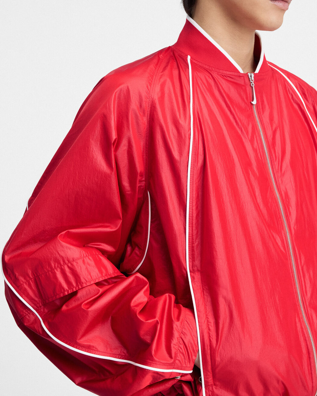The JACQUEMUS+NIKE track jacket the jacquemus nike track jacket
