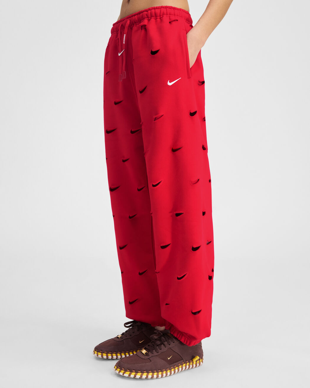 The Swoosh JACQUEMUS+NIKE track pants the swoosh jacquemus nike track pants