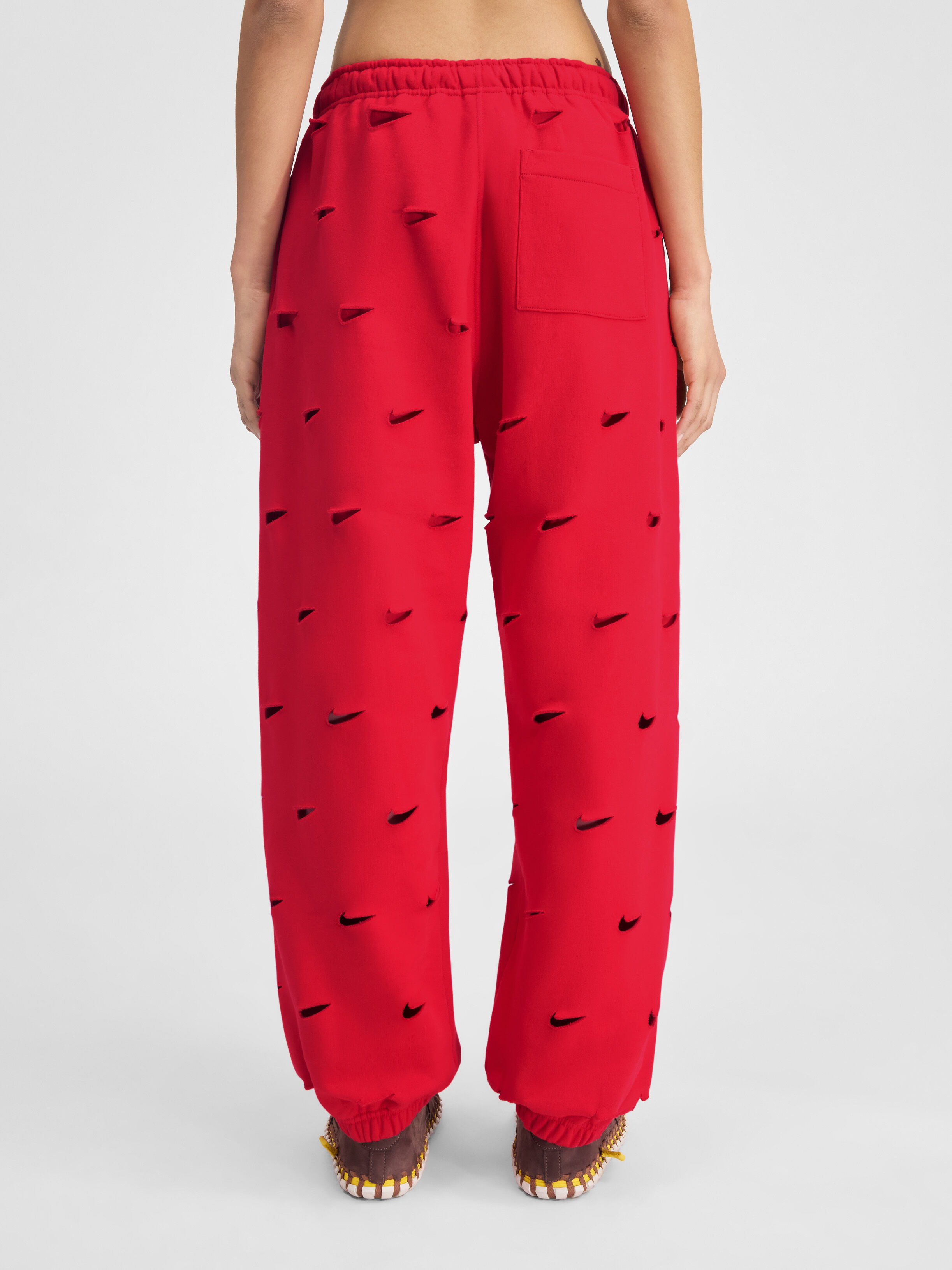 nike swoosh all over pants