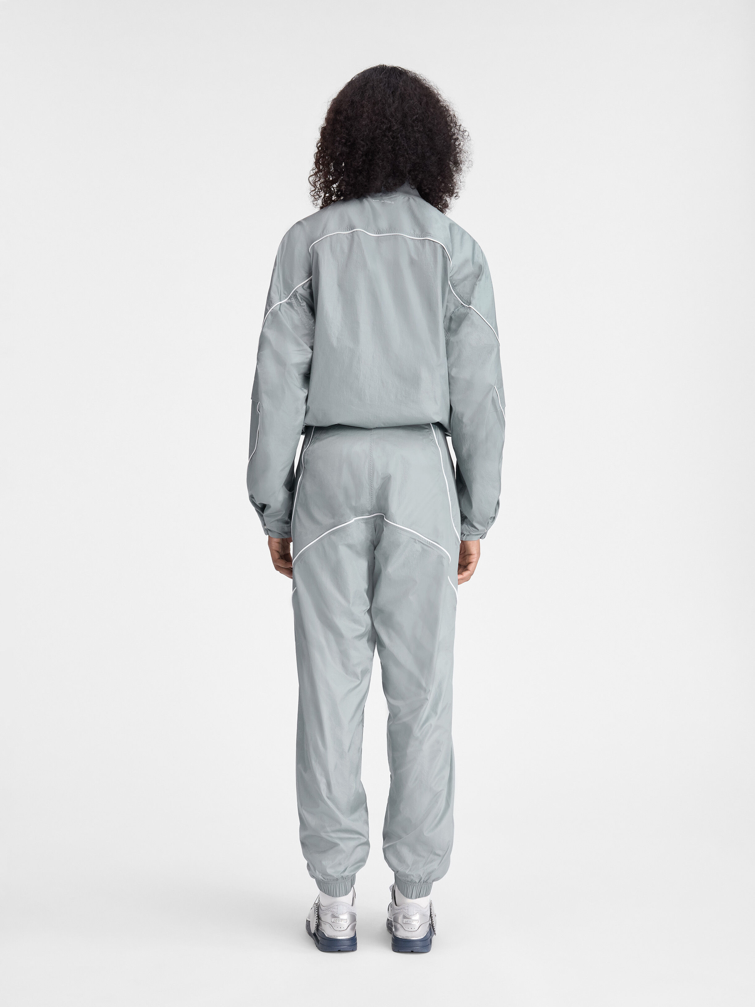 JACQUEMUS × NIKE Track Jacket グレー The JACQUEMUS+NIKE track jacket, Grey | JACQUEMUS UAE