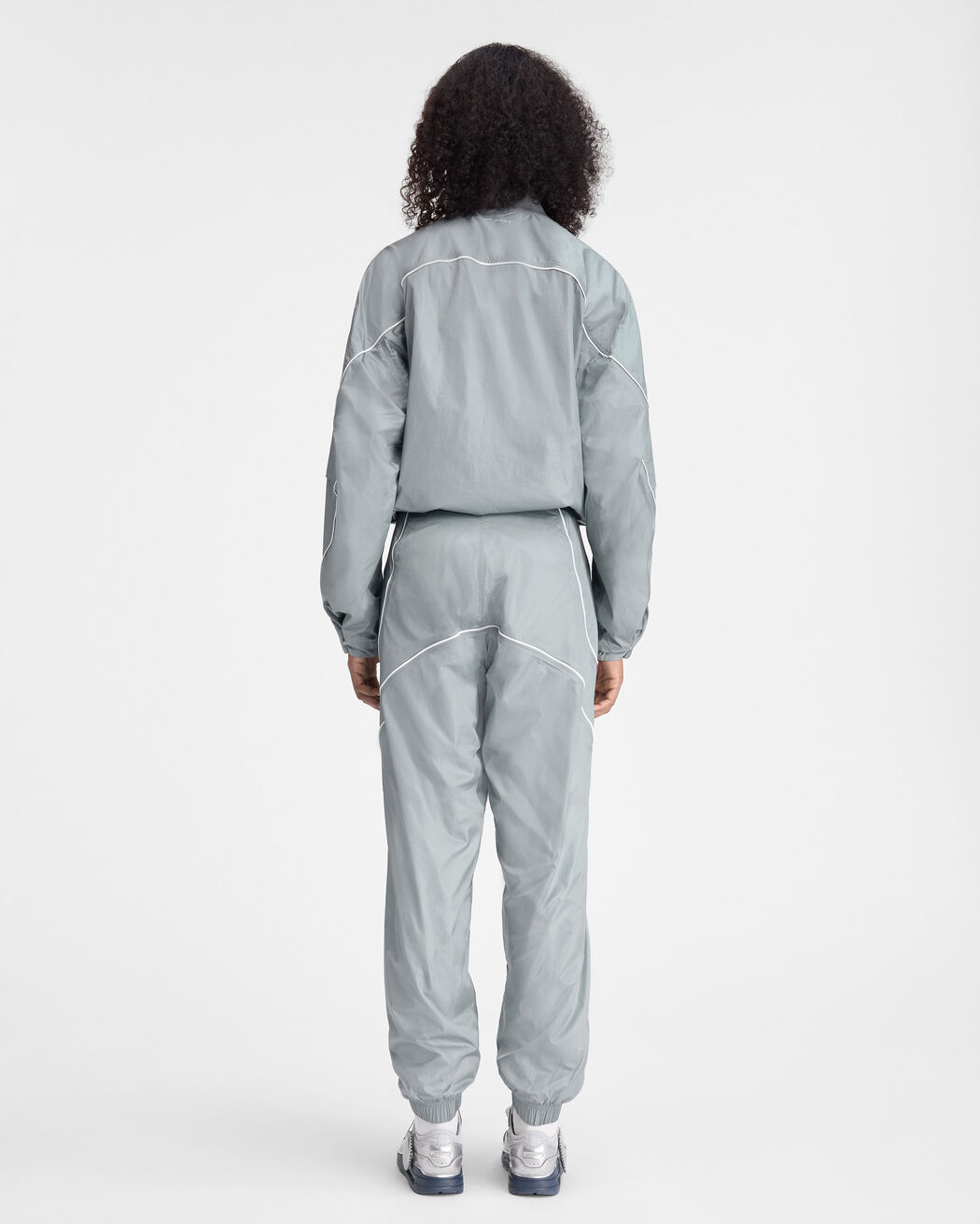 The JACQUEMUS+NIKE track jacket the jacquemus nike track jacket