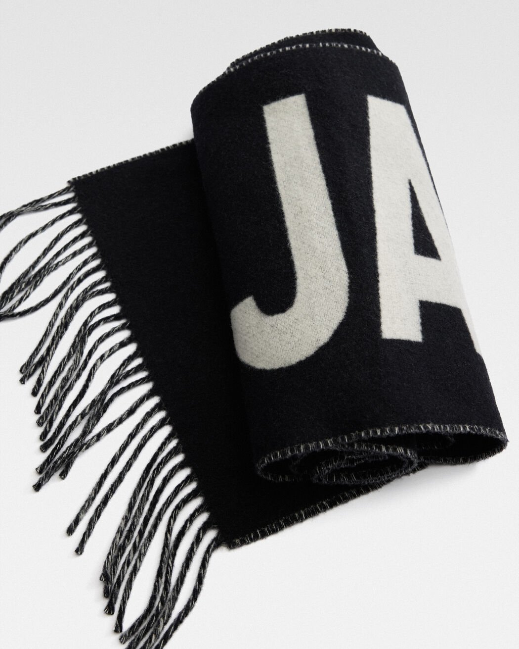 The Jacquemus scarf وشاح the jacquemus scarf وشاح
