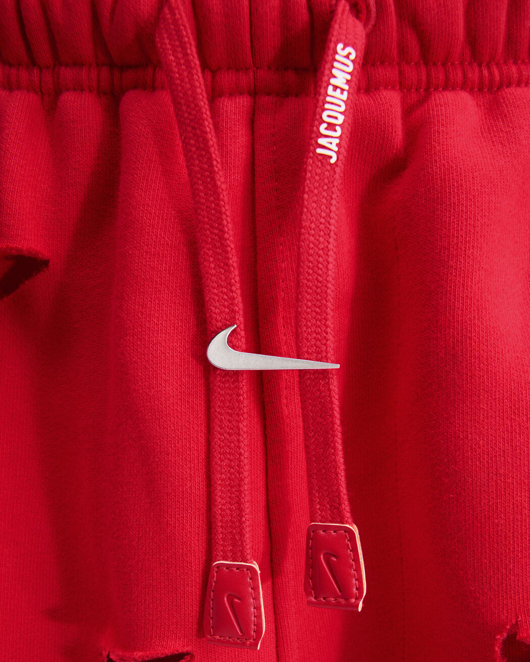 The Swoosh JACQUEMUS+NIKE track pants the swoosh jacquemus nike track pants