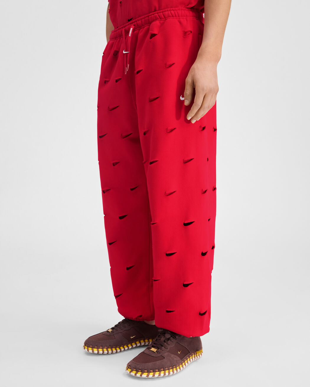 The Swoosh JACQUEMUS+NIKE track pants the swoosh jacquemus nike track pants