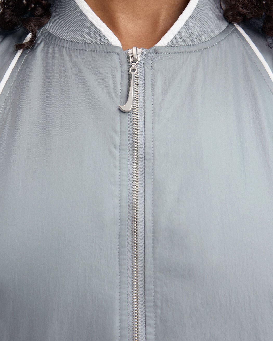 The JACQUEMUS+NIKE track jacket the jacquemus nike track jacket