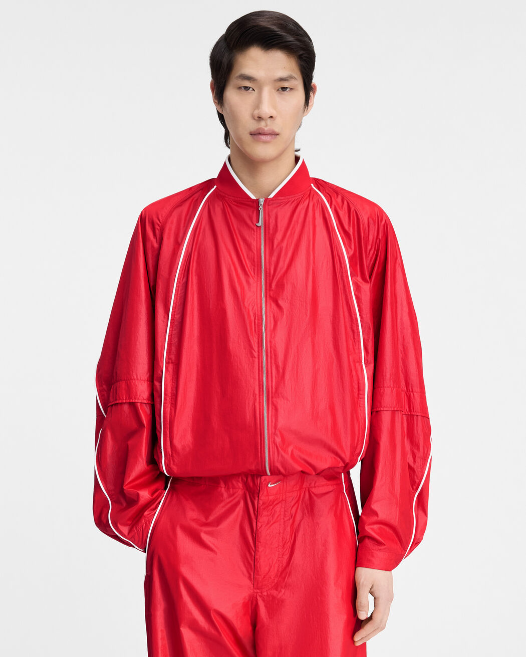 The JACQUEMUS+NIKE track jacket the jacquemus nike track jacket