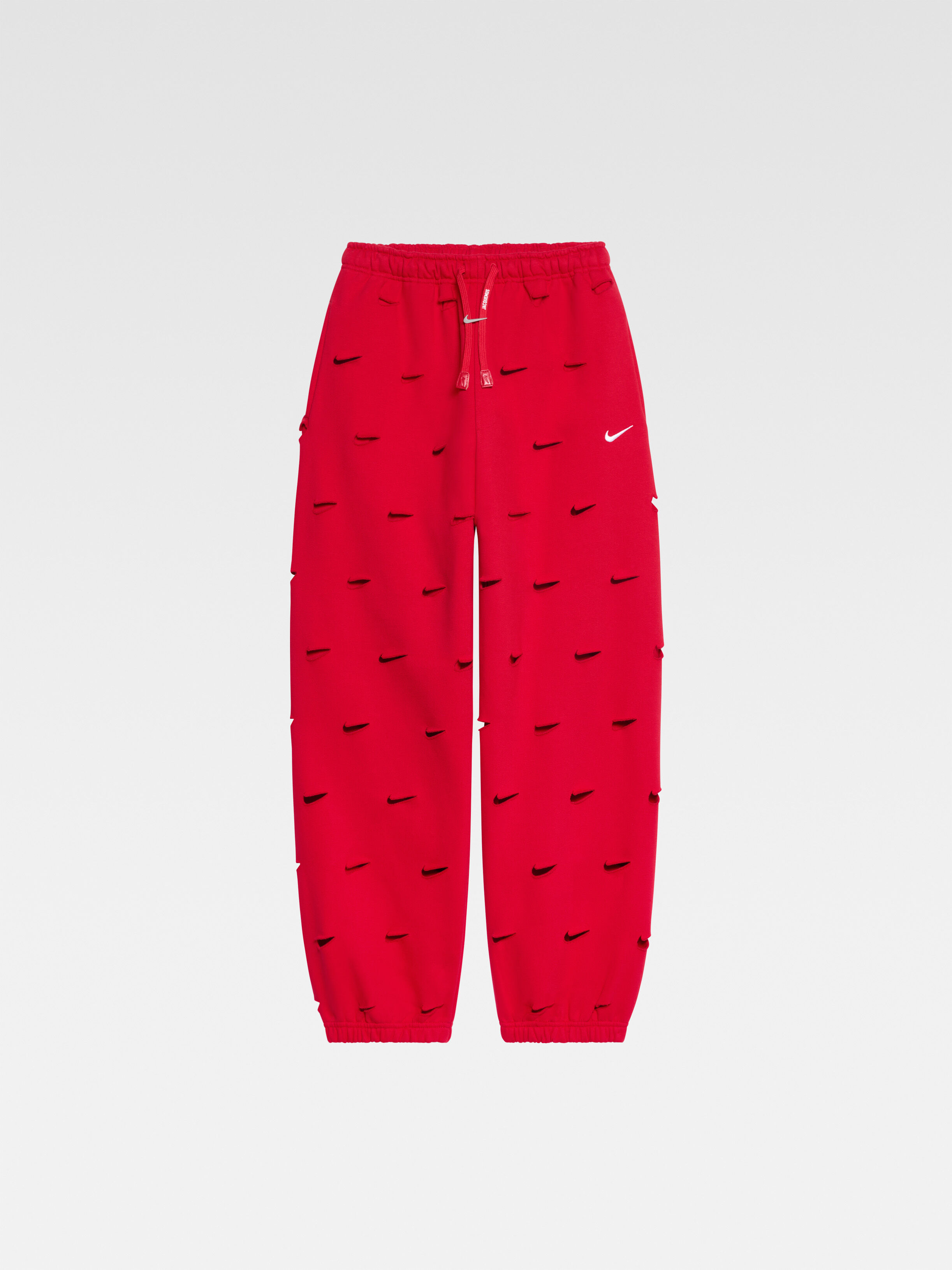 nike swoosh all over pants