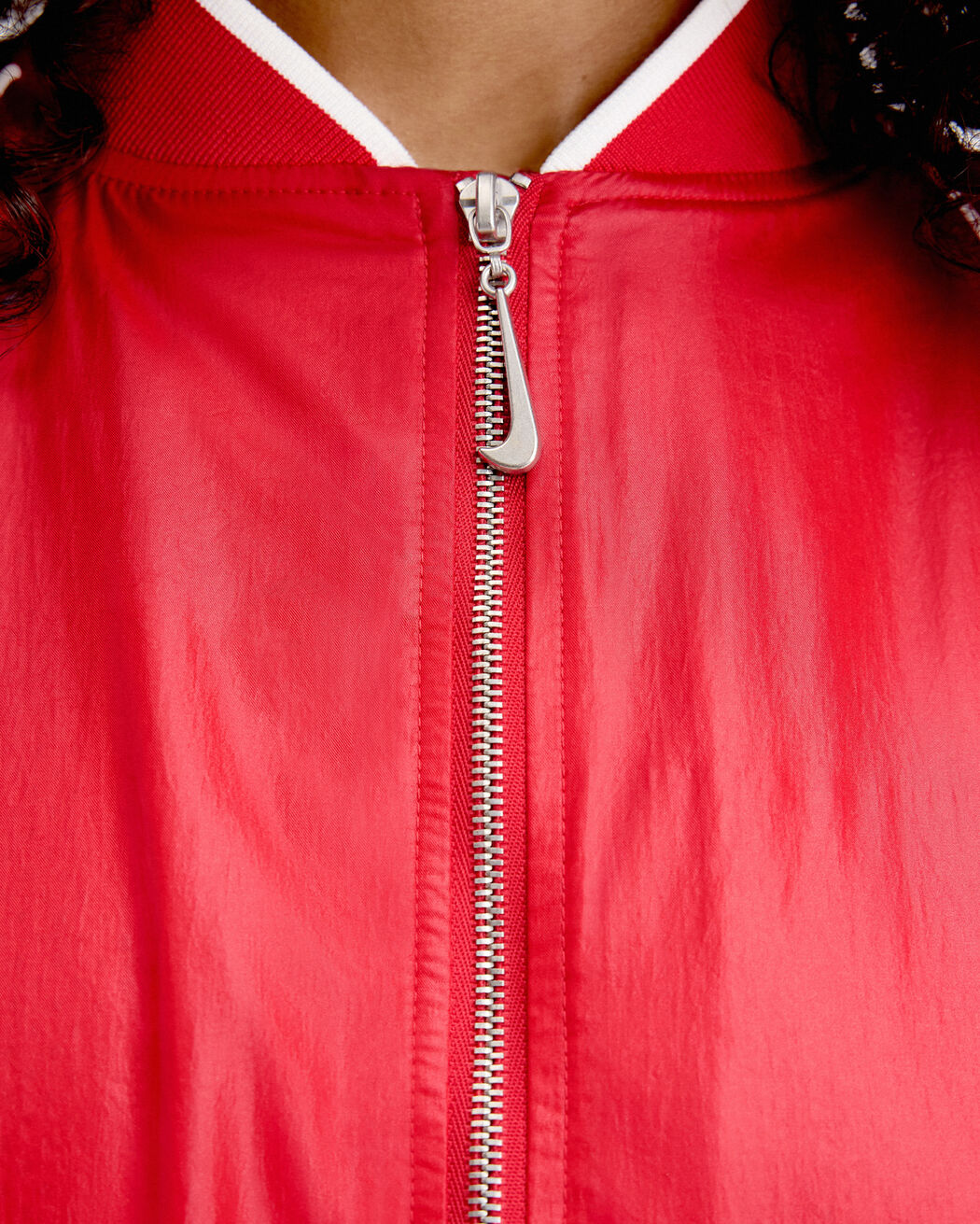 The JACQUEMUS+NIKE track jacket the jacquemus nike track jacket