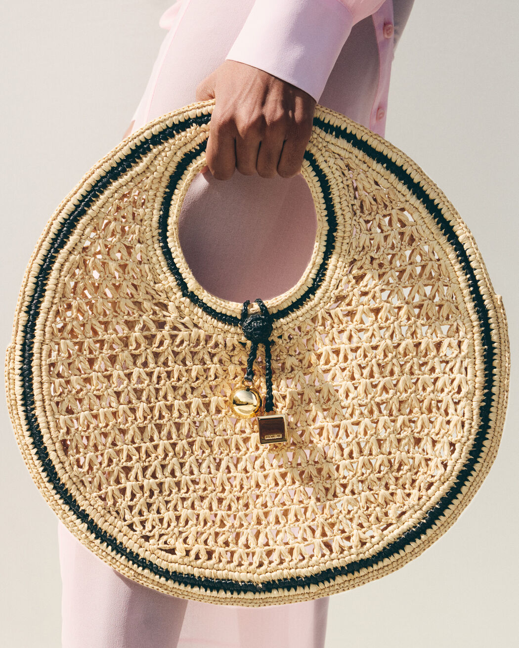 The Spiaggia small round bag jacquemus the spiaggia small round bag