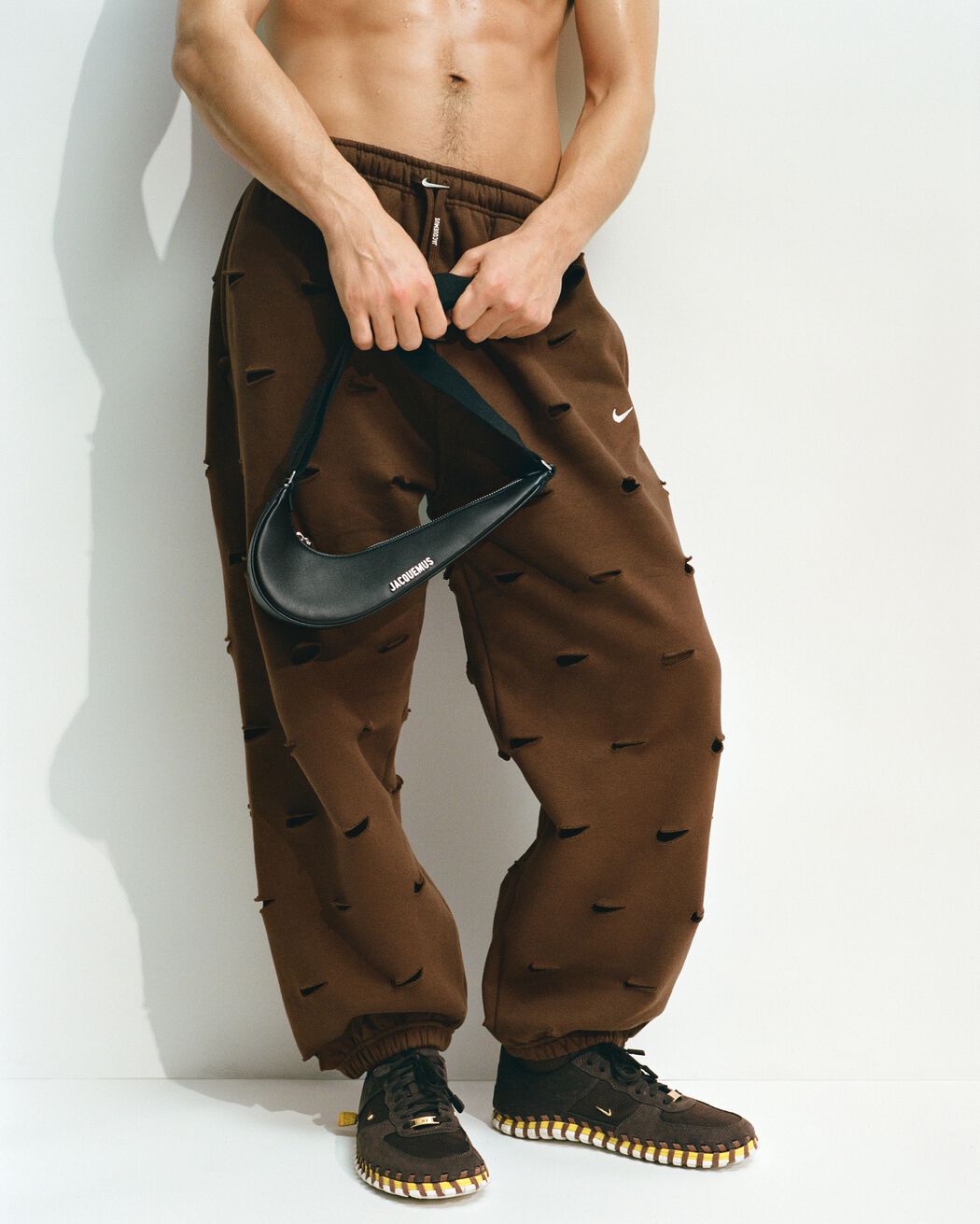 The Swoosh JACQUEMUS+NIKE track pants the swoosh jacquemus nike track pants