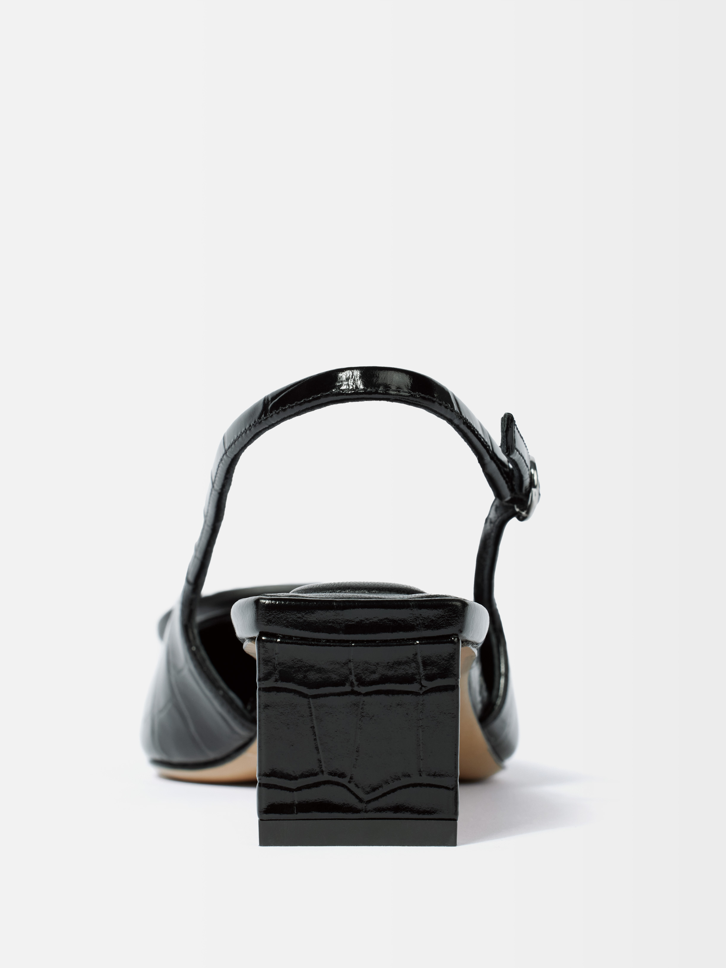 The Low Duelo Slingbacks