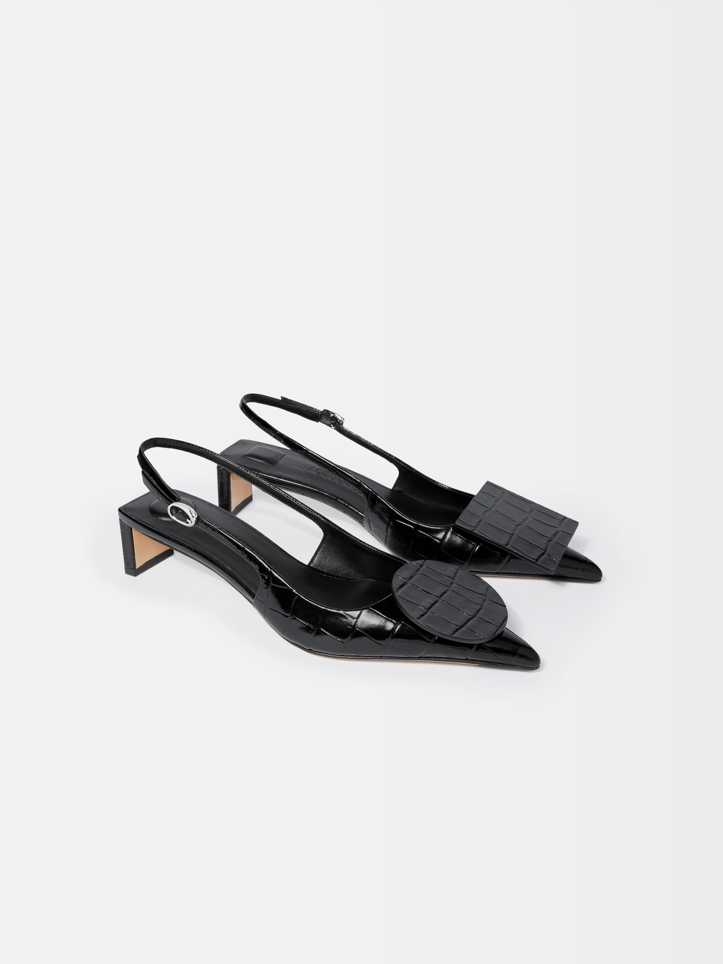 The Low Duelo Slingbacks
